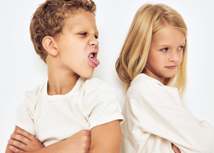 The boy is offended by the little girl quarrel resentment lifestyle Studio